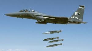 A group of military jets flying in the sky Description automatically generated with low confidence
